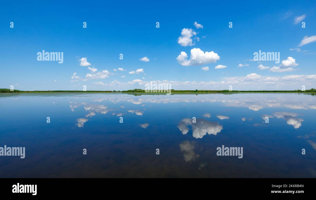 Cloud reflection in the Danube Delta Stock Photo - Alamy