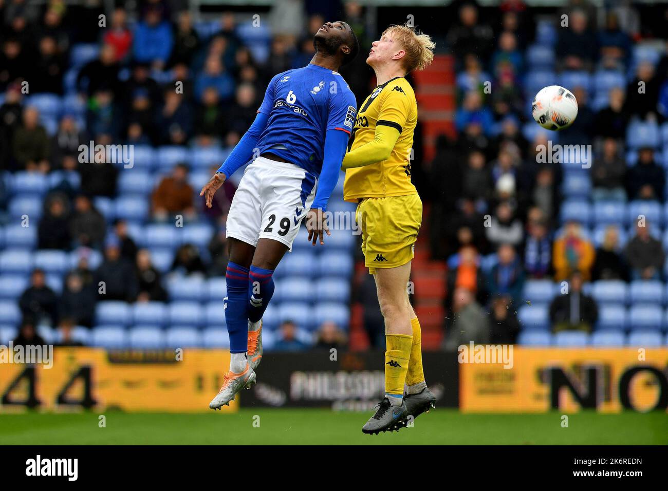 during the FA Cup 4th Qualifying Round match between Oldham Athletic and Chester at Boundary Park, Oldham on Saturday 15th October 2022. (Credit: Eddie Garvey | MI News)Junior Luamba of Oldham Athletic tussles with Matty Williams of Chester during the FA Cup 4th Qualifying Round match between Oldham Athletic and Chester at Boundary Park, Oldham on Saturday 15th October 2022. (Credit: Eddie Garvey | MI News) Credit: MI News & Sport /Alamy Live News Stock Photo