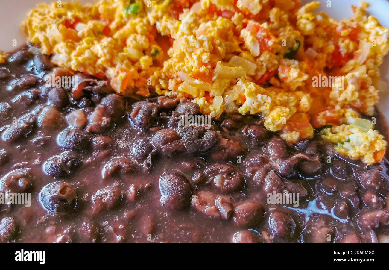 Mexican breakfast scrambled eggs with black beans in Zicatela Puerto