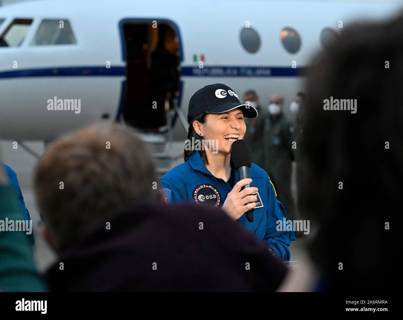 Cologne, Germany. 15th Oct, 2022. Italian astronaut Samantha Cristoforetti speaks to the press at the military section of Cologne/Bonn Airport after her arrival. The astronaut was the first woman from Europe to hold the role of commander of the International Space Station (ISS) in September 2022. Upon her arrival, she was greeted by ESA staff and family. Credit: Roberto Pfeil/dpa/Alamy Live News Stock Photo