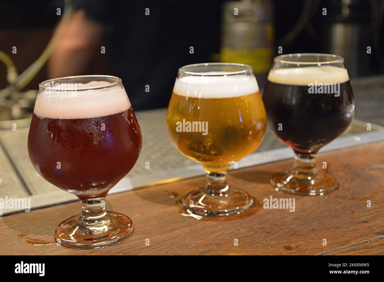 Glasses of beer on a bar Stock Photo