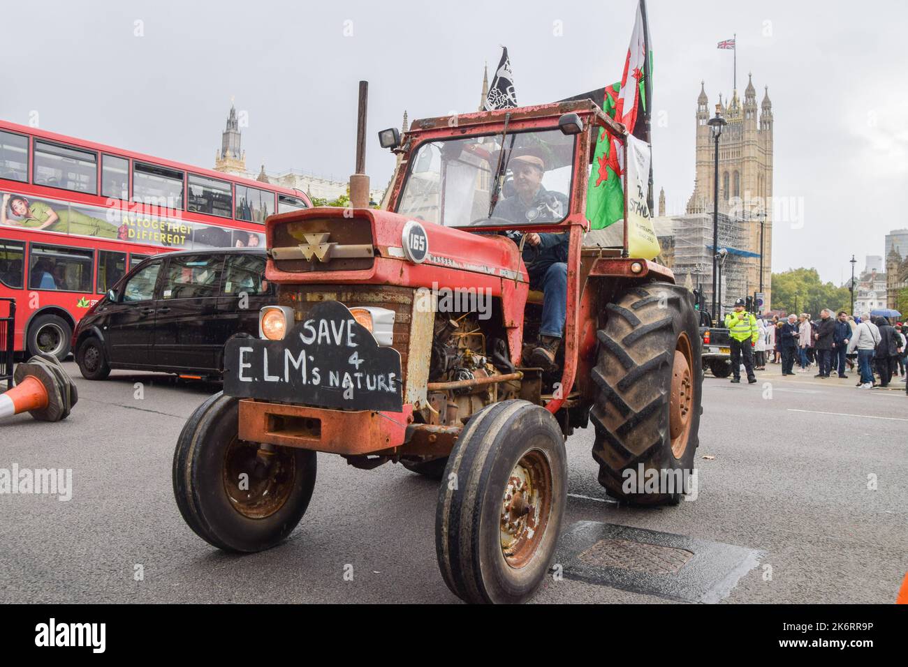 London, England, UK. 15th Oct, 2022. A protester drives a tractor in