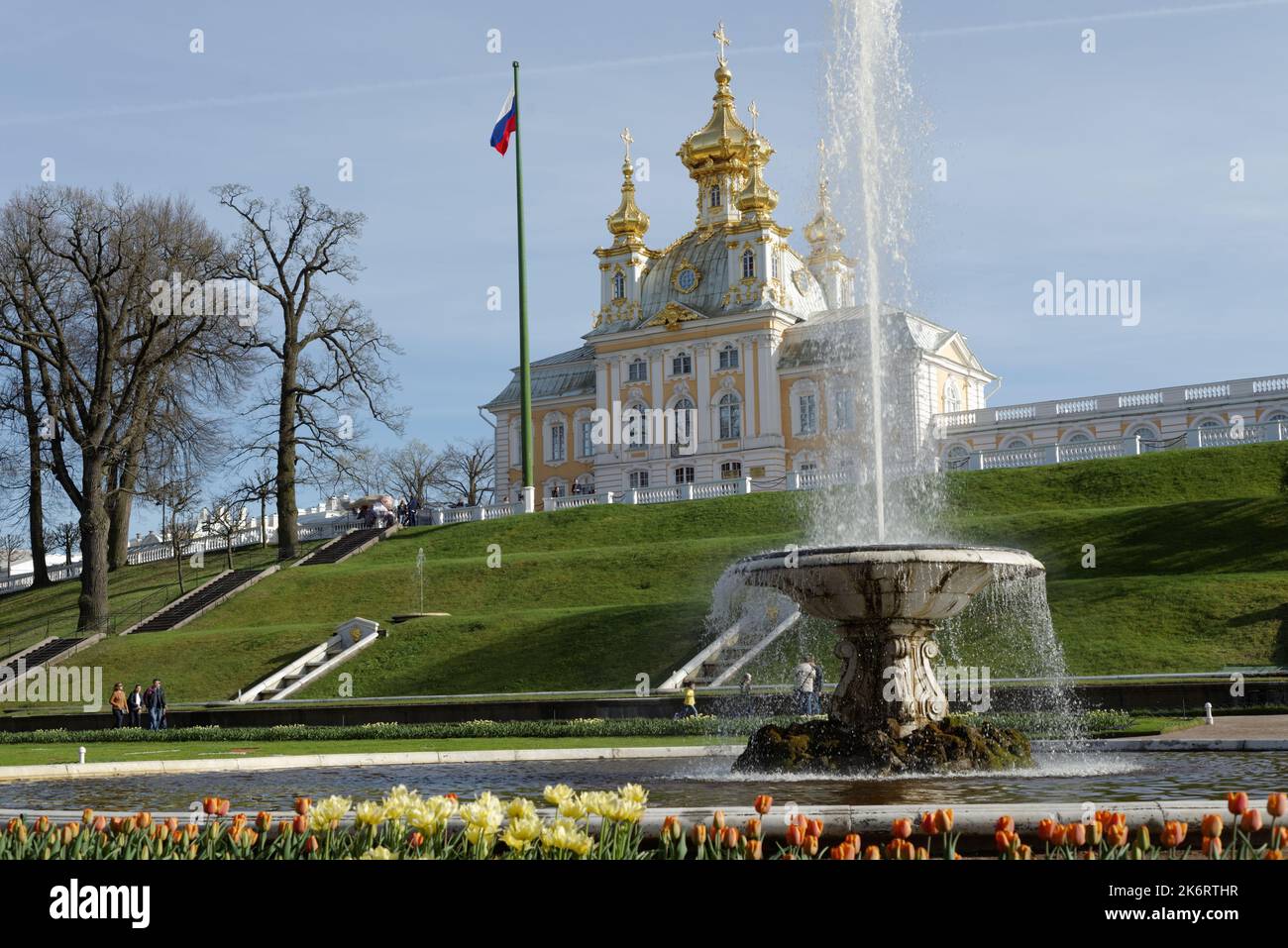 French fountain against the East Chapel flanking the central buildings of Grand Peterhof Palace in St. Petersburg, Russia Stock Photo