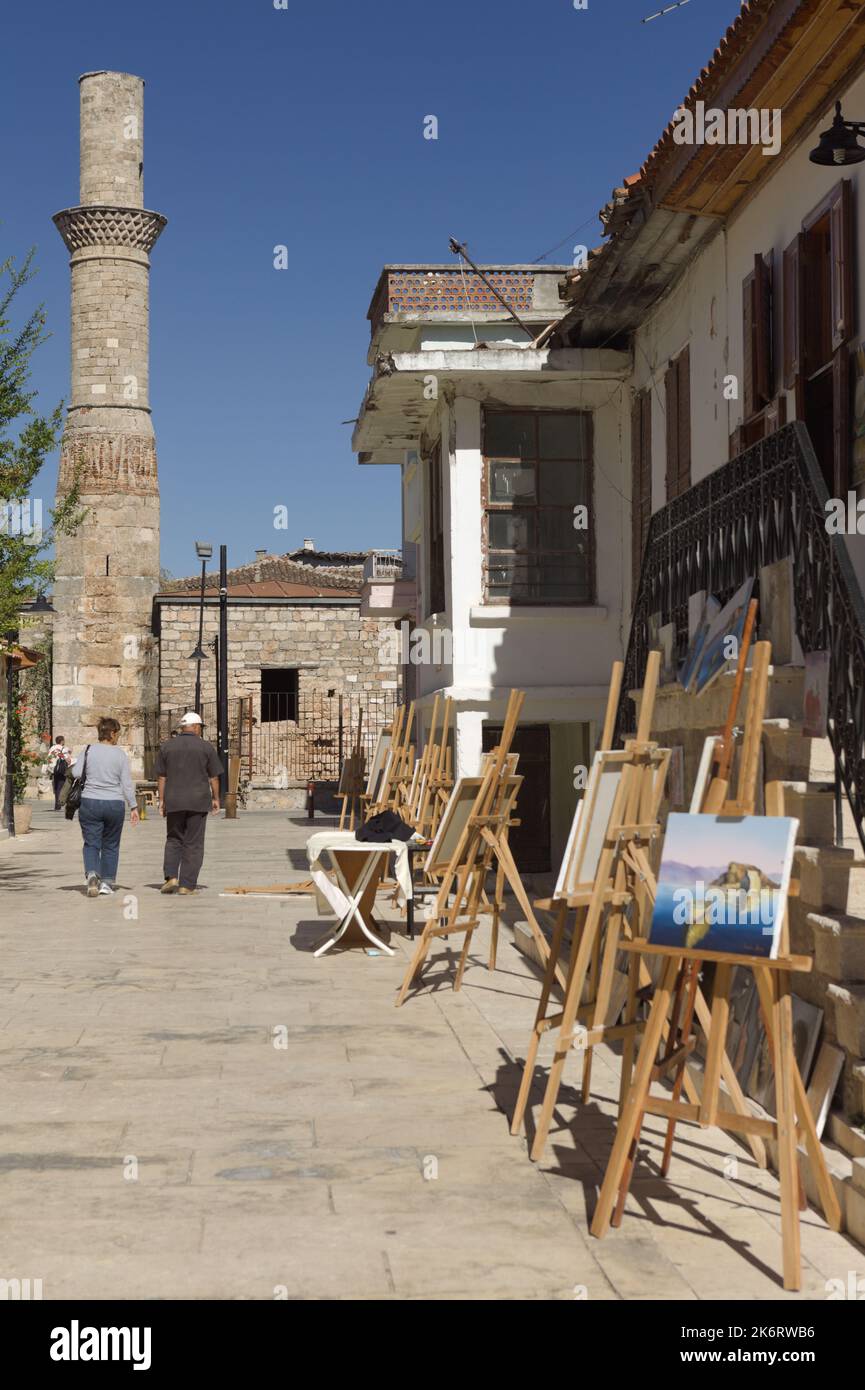 Paintings exhibited at the Broken Minaret Mosque, Kesik Minare Cami in the old city of Antalya, Turkey Stock Photo