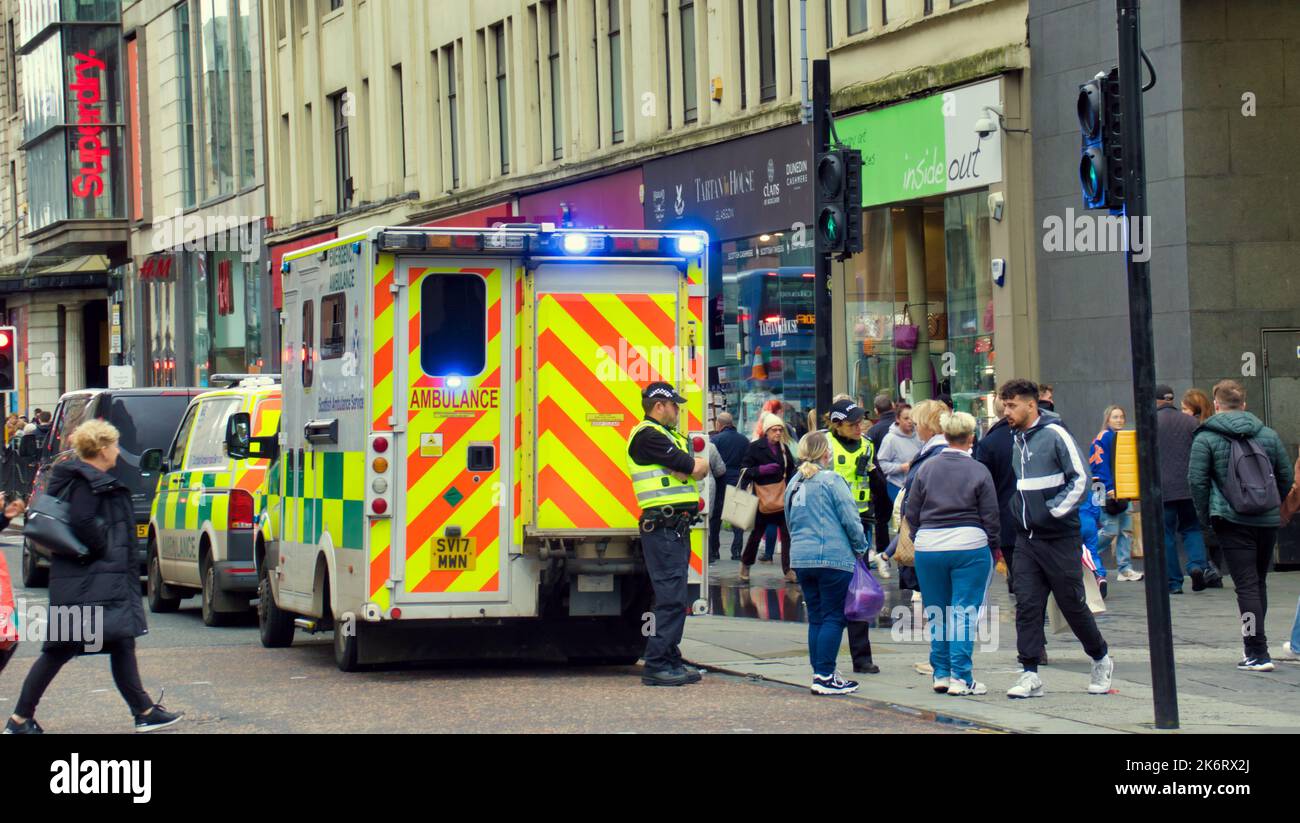 Ambulance and police attending incident on the street outside the st enoch centre on argyle street Glasgow, Scotland, UK Stock Photo