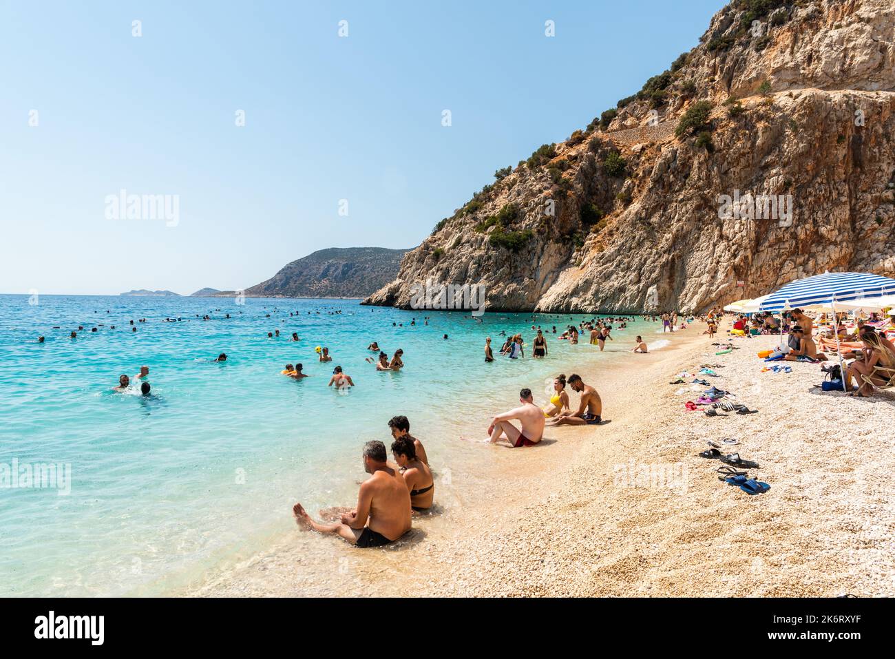 Kalkan, Antalya, Turkey – August 13, 2021. Kaputas beach near Kalkan resort town of Antalya province in Turkey. The sandy little cove of Kaputas is ab Stock Photo