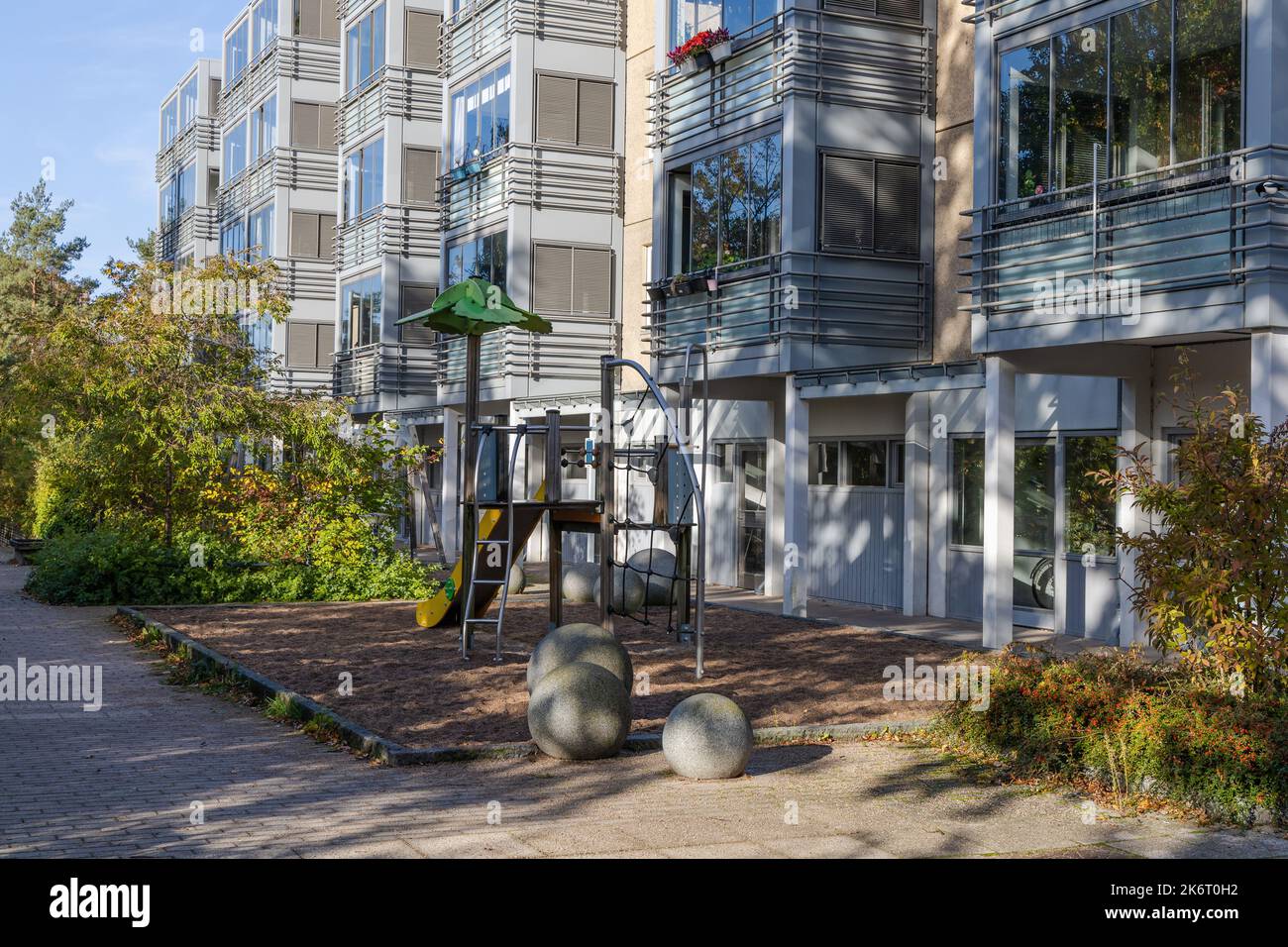 House facade in Copenhagen, Denmark. Residential building with playground. Real estate
