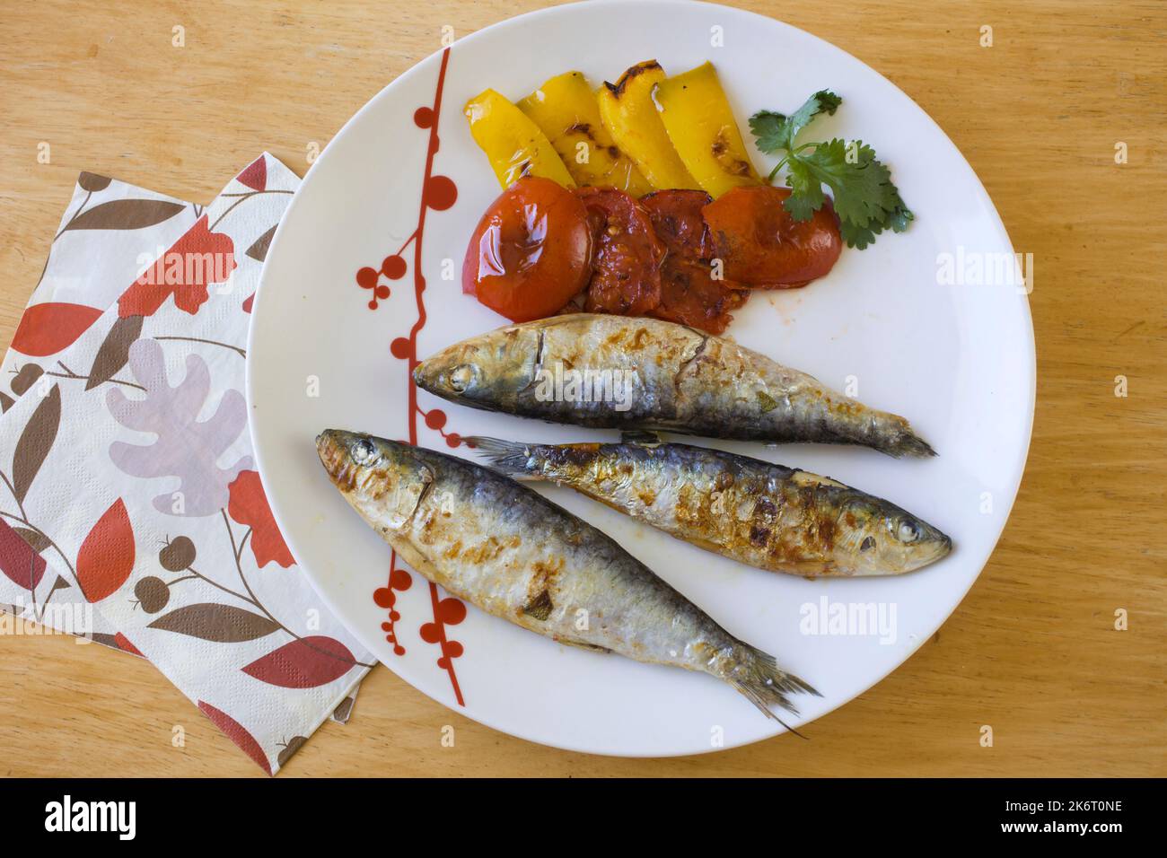 Grilled sardines, salad Stock Photo Alamy