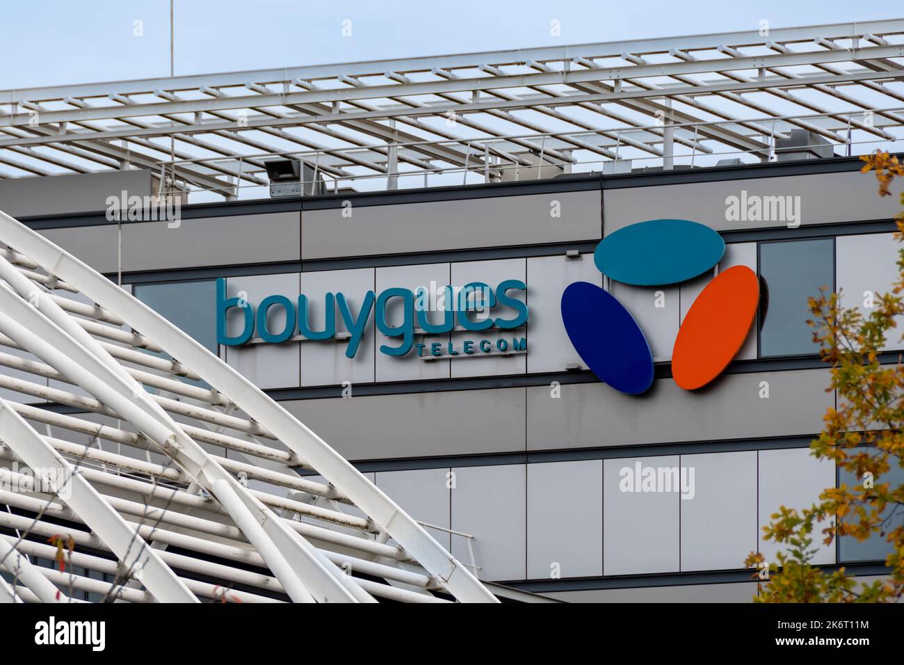 Logo on the facade of the technopole building of Bouygues Telecom, French telecommunications operator, subsidiary of the Bouygues group Stock Photo
