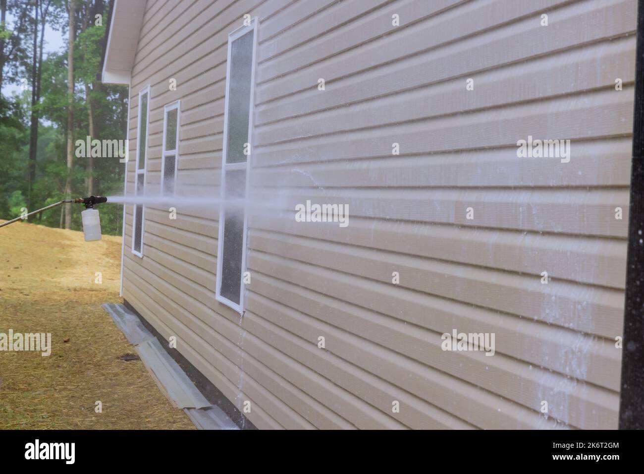 Maintenance services for washing siding houses with the use of high