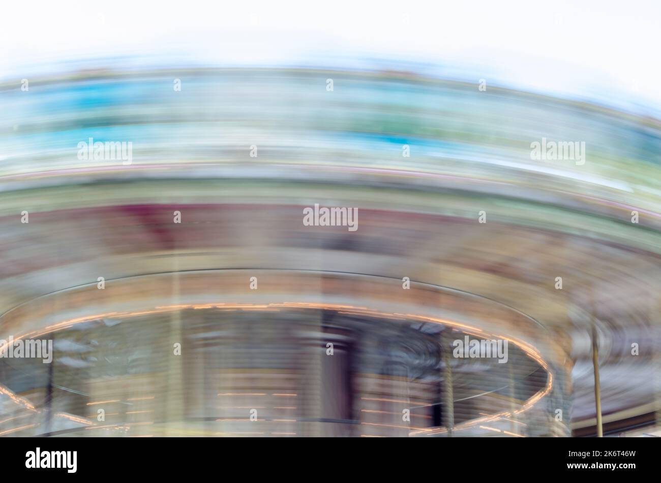 Recirculating Carousel Carousel spinning at high speed, colorful background Stock Photo - Alamy