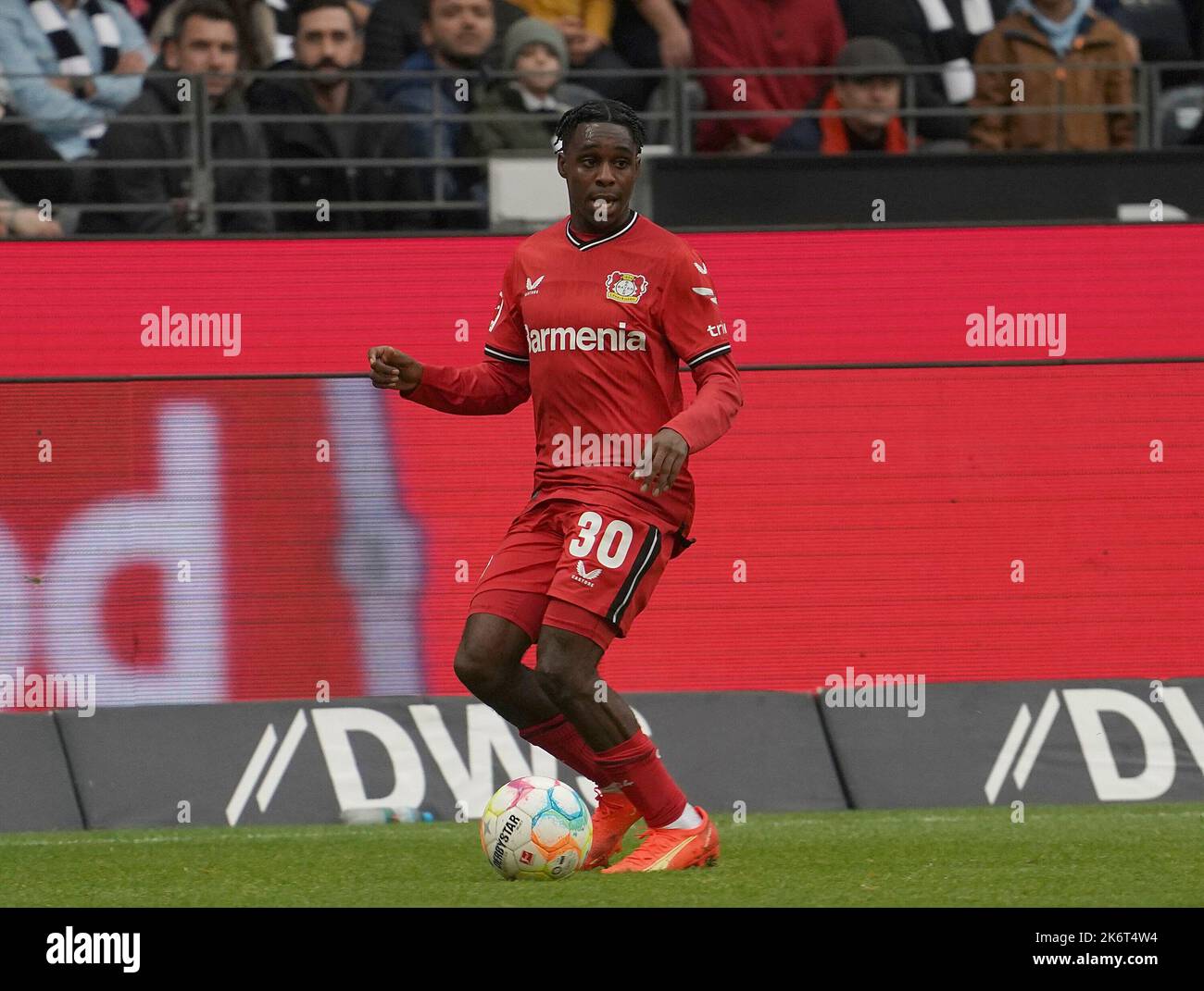 Jeremie FRIMPONG (Bayer 04 Leverkusen, #30) in a duel with Jakub KAMINSKI  (VfL Wolfsburg, #16), Stock Photo, Picture And Rights Managed Image. Pic.  PAH-321123917