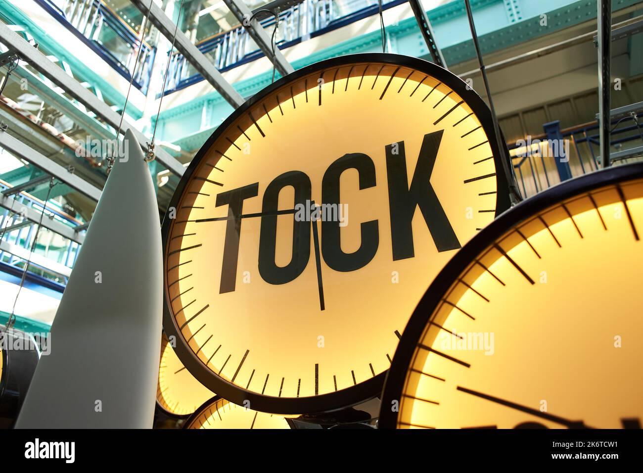 Clocks with inscriptions 'tik, tok and followed'.Yellow and blue Stock