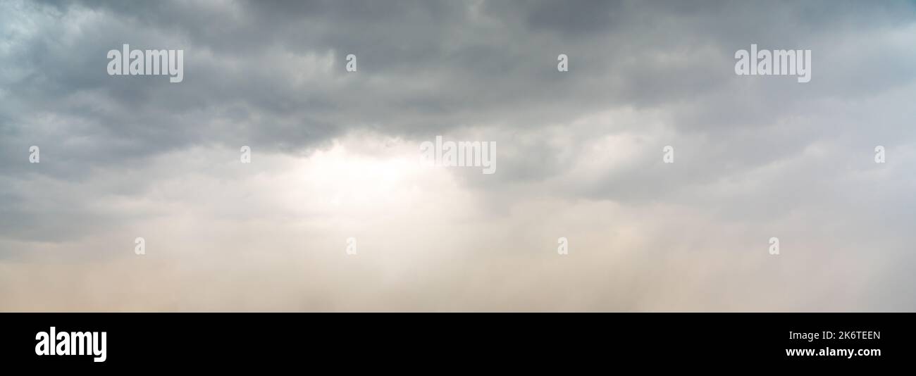 Dramatic sky background. Stormy clouds in dark sky. Moody cloudscape Stock Photo