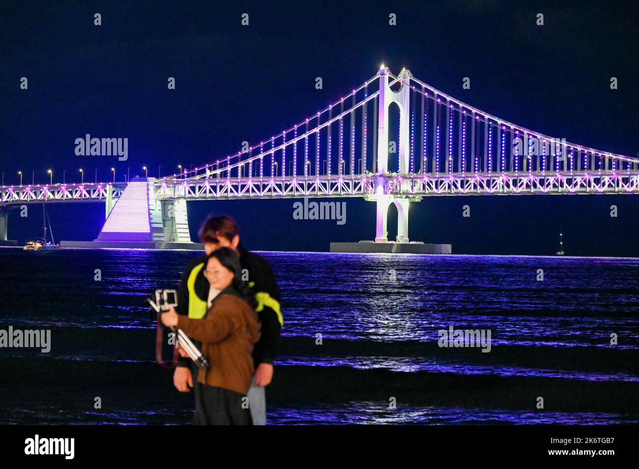 Busan, South Korea. 14th Oct, 2022. A fan takes photos near the venue for a BTS concert at Busan Asiad Main Stadium in Busan, South Korea on October 15, 2022. Photo by Thomas Maresca/UPI Credit: UPI/Alamy Live News Stock Photo