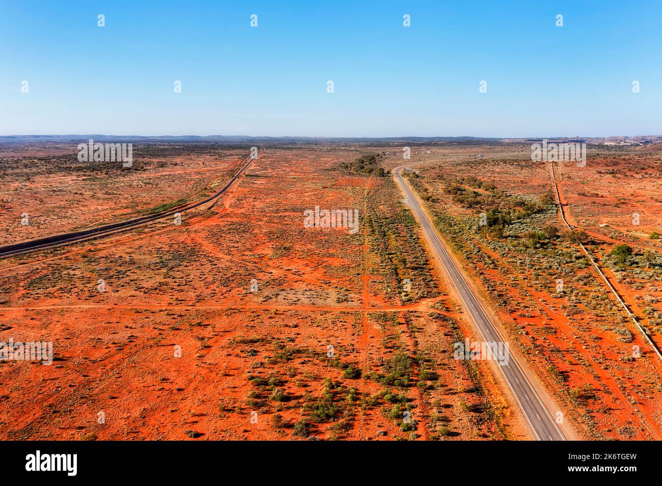 A32 Barrier highway near railway line to Broken Hill city in Australian outback. Stock Photo
