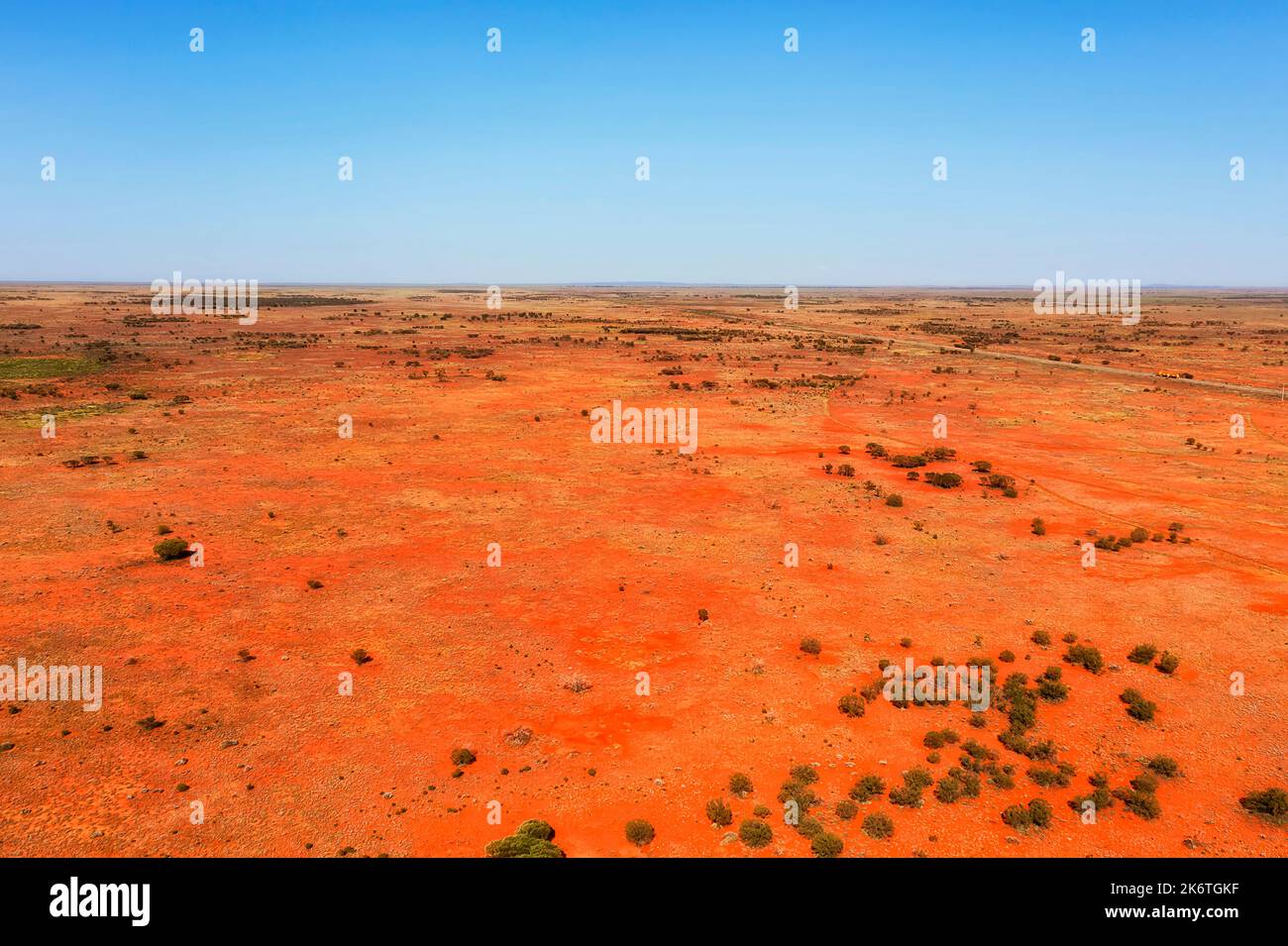 Red soil arid australian outback at Little Topar stop over on Barrier Highway to Broken Hill city - aerial landscape. Stock Photo