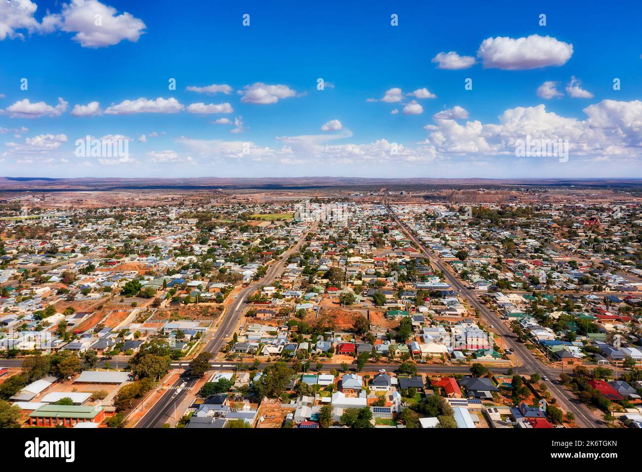 Suburbs of residential streets and houses of Broken hill city in Australian outback - aerial townscape. Stock Photo
