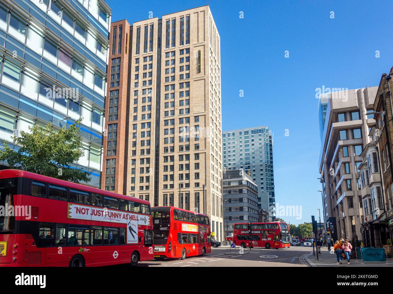 Local buses double decker corner high rise buildings algate high hires