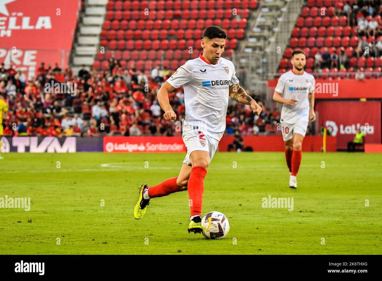 MALLORCA, SPAIN - OCTOBER 15: Gonzalo Montiel of Sevilla CF drives the ball during the match between RCD Mallorca and Sevilla CF of La Liga Santander on October 15, 2022 at Son Moix Stadium of Mallorca, Spain. (Photo by Samuel Carreño/PxImages) Credit: Px Images/Alamy Live News Stock Photo