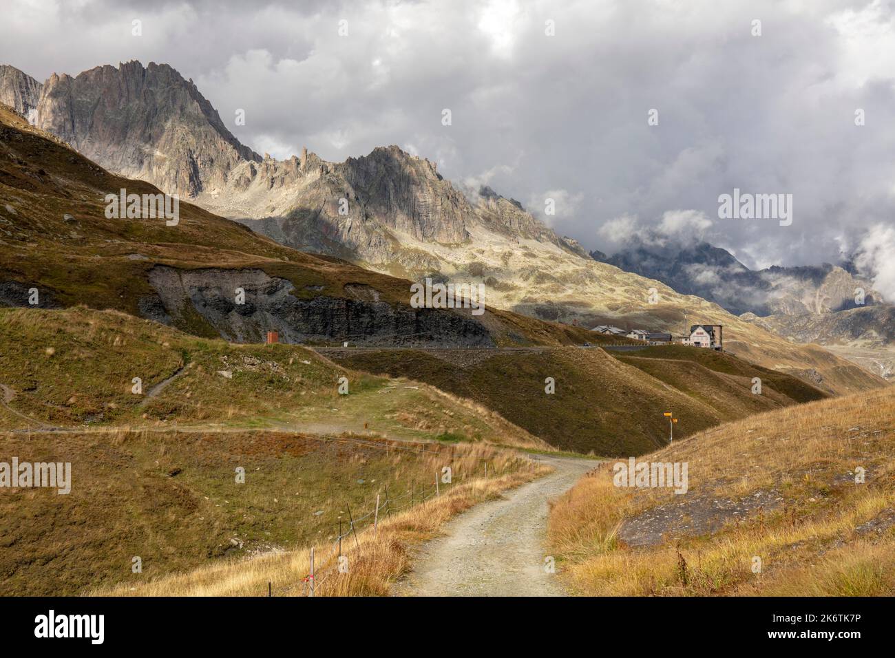 Incoming bad weather, clouds and fog, Furkahorn on the left, Winterstock behind, Furkapass, Valais, Uri, Switzerland Stock Photo