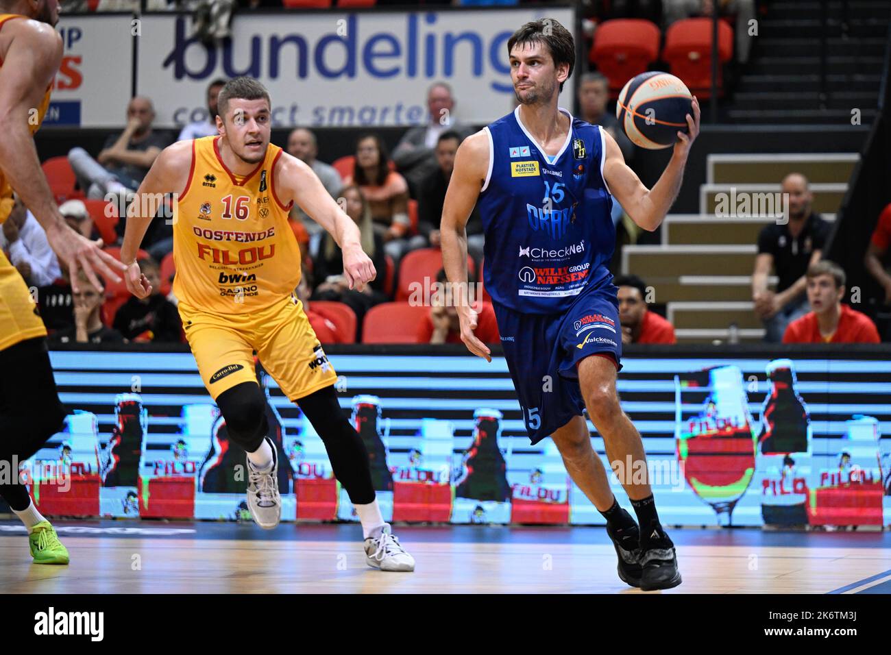 Oostende's Haris Bratanovic and Aalst's Dorian Marchant fight for the ball  during a basketball match between BC Oostende and Okapi Aalst, Saturday 15  October 2022 in Oostende, on day 03 of the