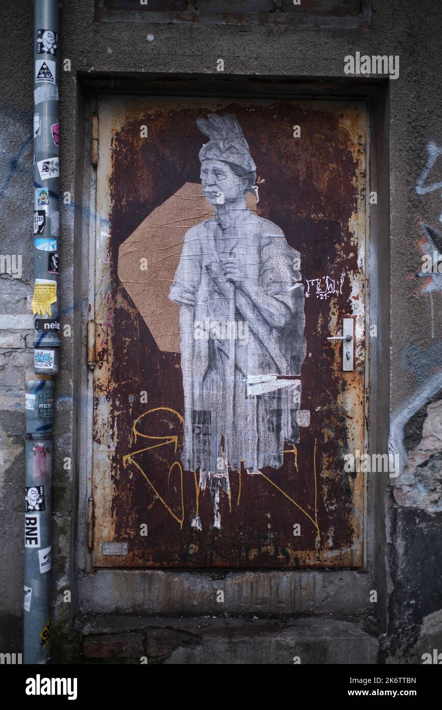 Germany, Berlin, 30. 01. 2021, graffiti of an Indian, iron door, railway bridge Universitaetsstrasse Stock Photo