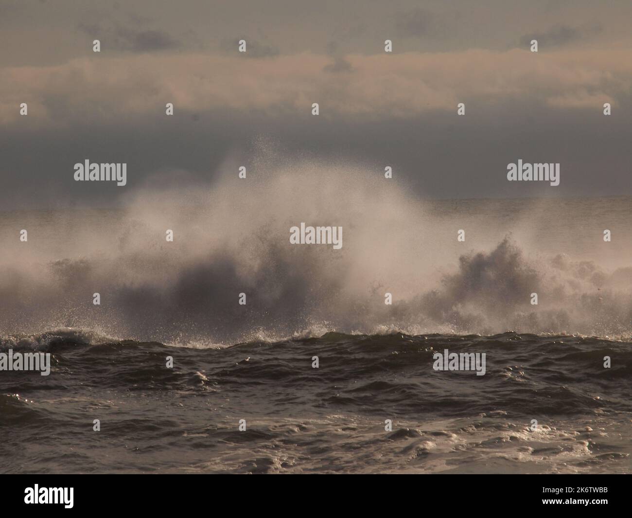 Storm tossed waves crashing against the coast of New Jersey with the