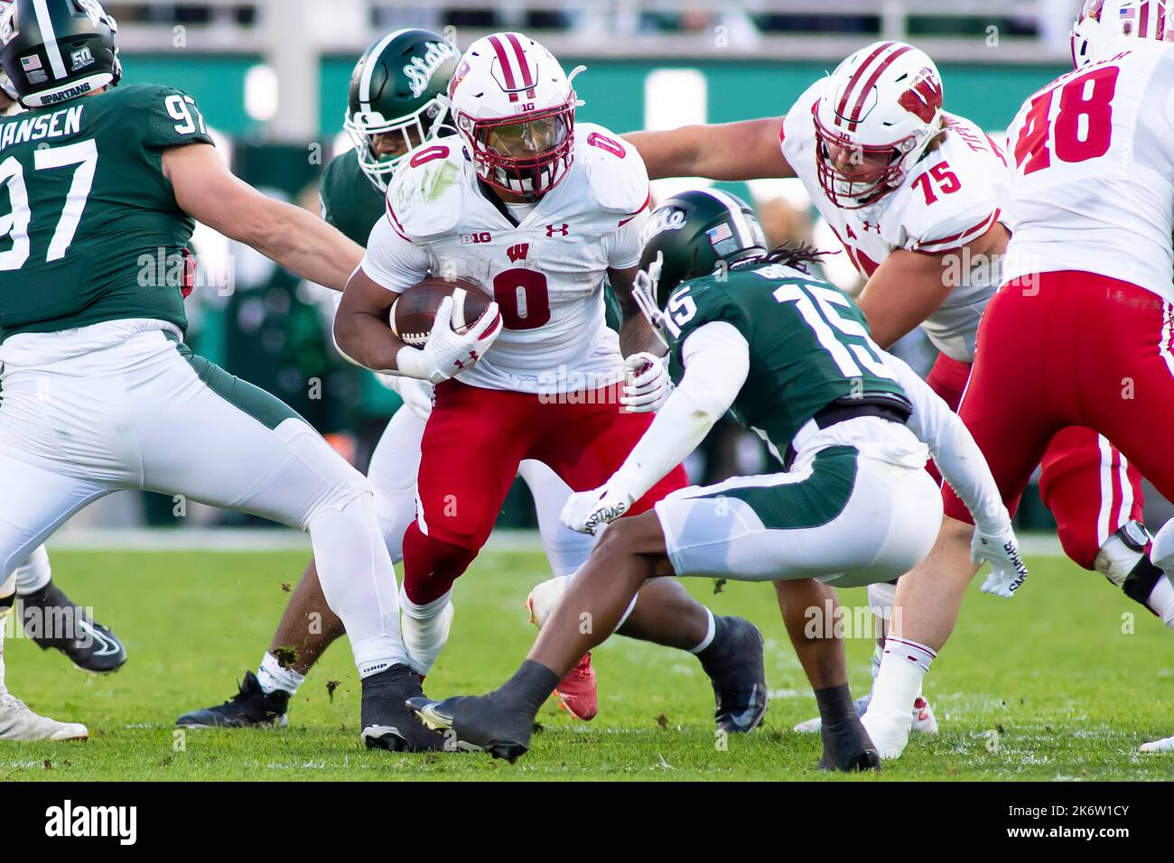 East Lansing, Michigan, USA. 15th Oct, 2022. Wisconsin running back BRAELON ALLEN (0) carries the ball during Michigan State's 34-28 win over Wisconsin at Spartan Stadium. (Credit Image: © Scott Mapes/ZUMA Press Wire) Credit: ZUMA Press, Inc./Alamy Live News Stock Photo