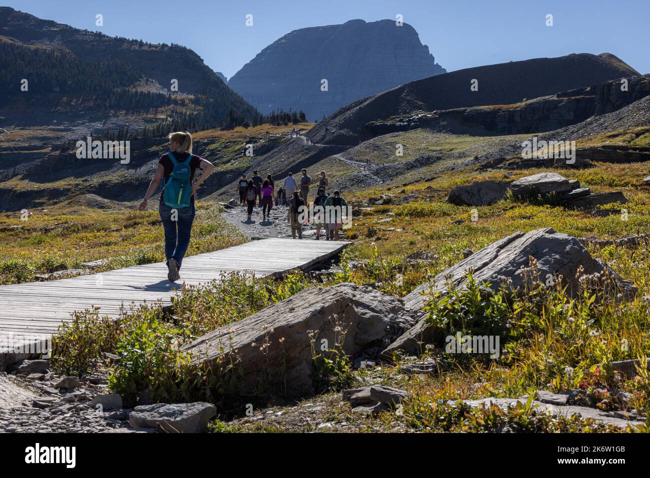 Glacier National Park, Montana USA - September 26 2022: Hikers on the popular trail for Hidden Lake on top of Logan Pass Stock Photo