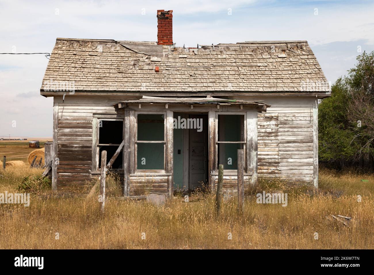 Abandoned farmhouse in the ghost town of Robsart, Saskatchewan. Stock Photo