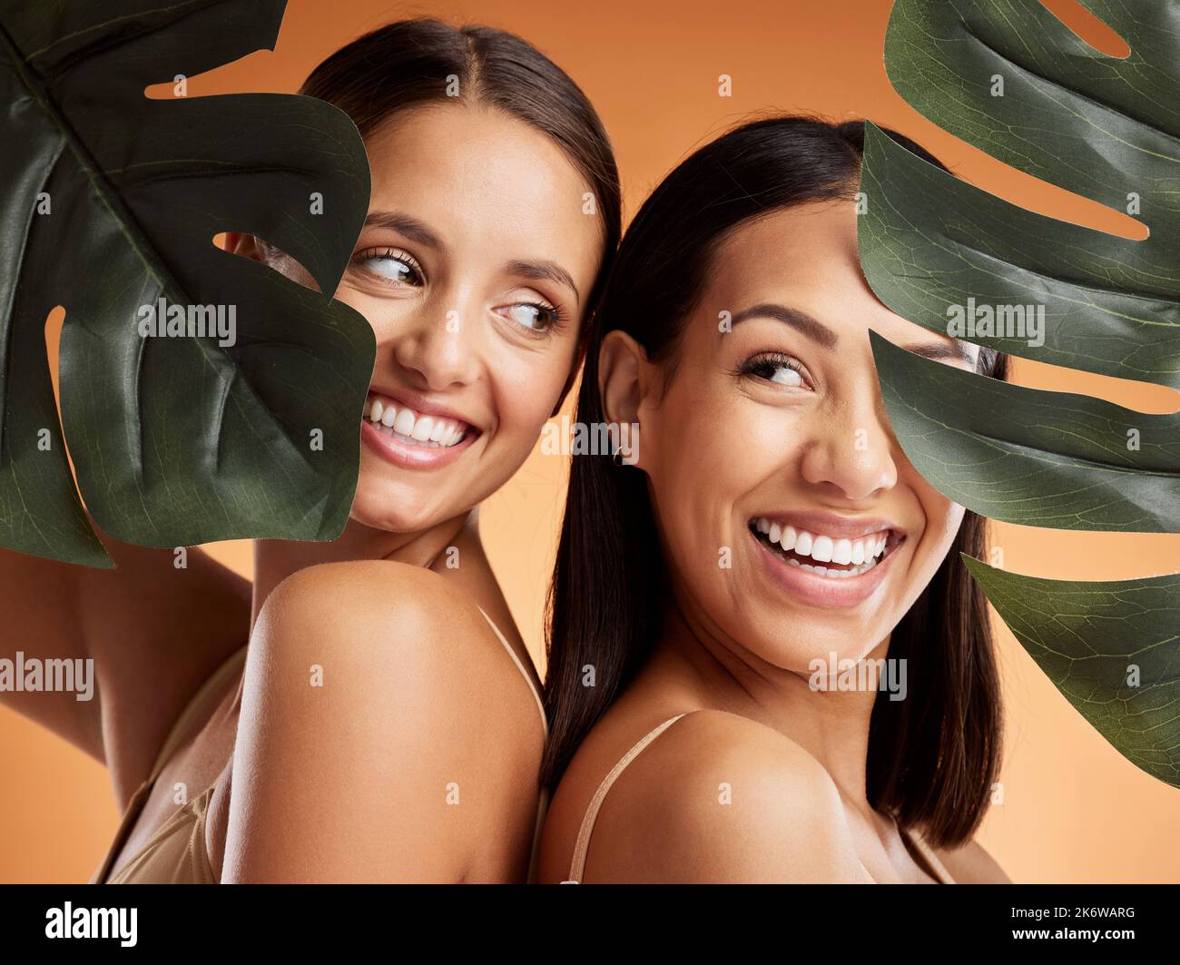Beauty, skincare and wellness with women and leaf for natural cosmetics, luxury and sustainability together. Health, spa and tropical plant with model Stock Photo