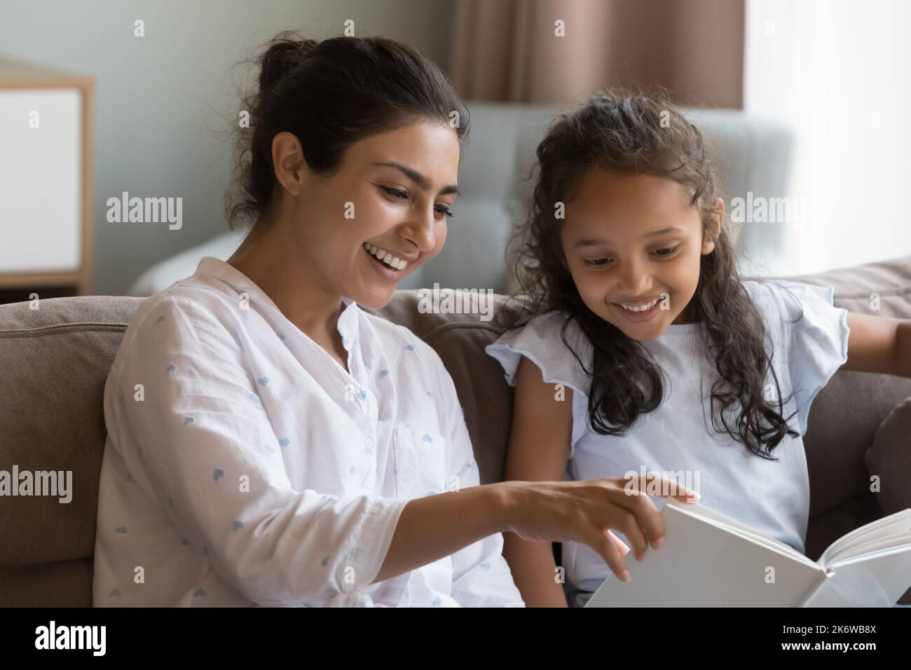 Indian girl reading a book hi-res stock photography and images - Alamy