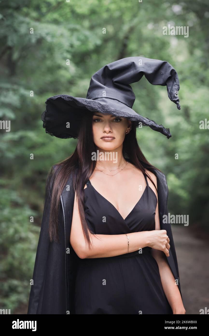 Back view woman in cloak hi-res stock photography and images - Alamy