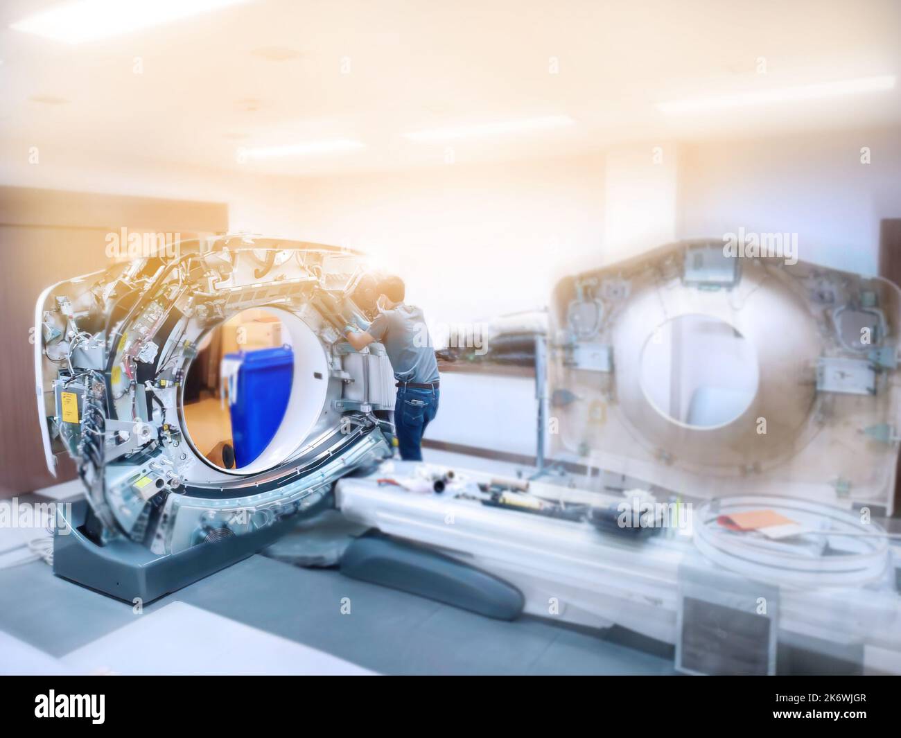 Maintenance engineer repairing and checking CT scanner machine every 3