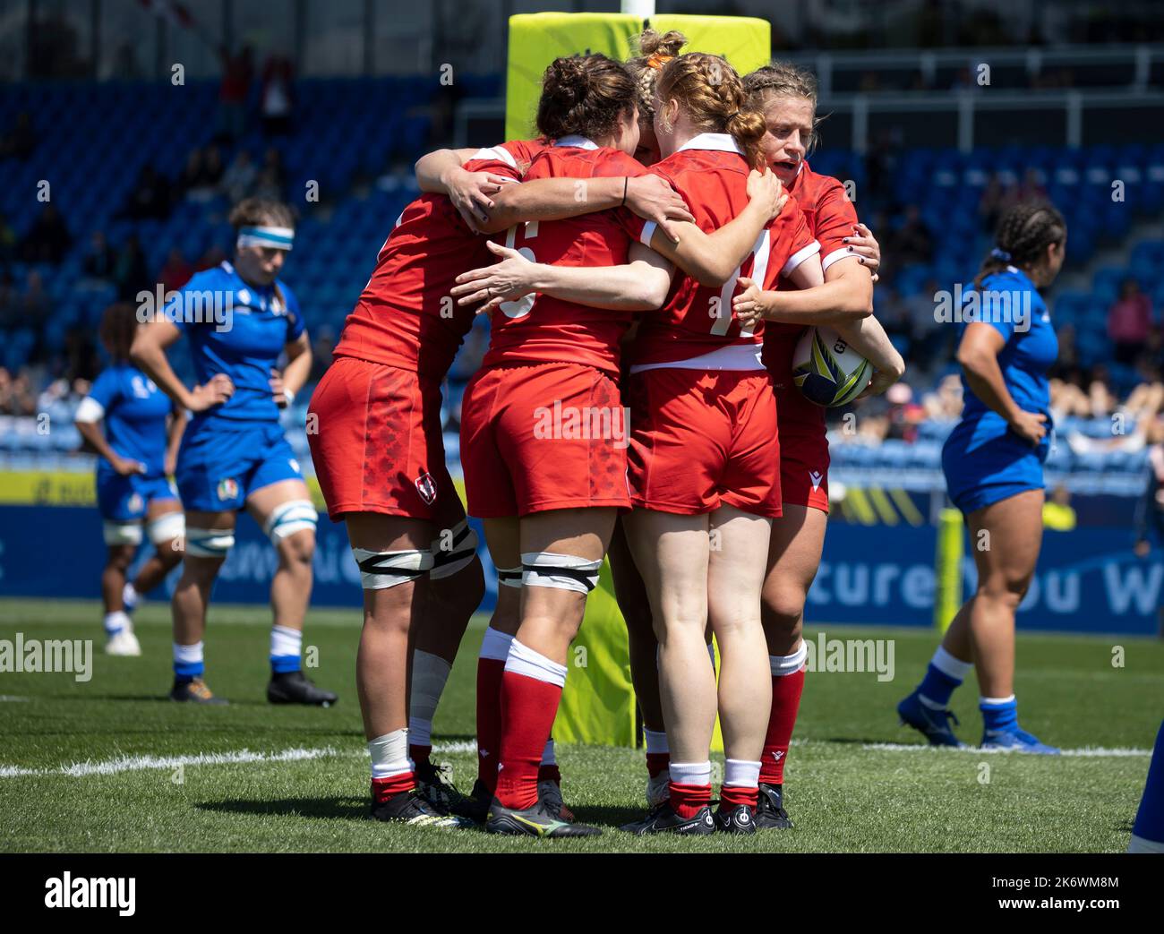 Canada players celebrate with Canada's Paige Farries after scoring the opening try for Canada during the Women's Rugby World Cup pool B match at Waitakere Stadium, Auckland, New Zealand. Picture date: Sunday October 16, 2022. Stock Photo