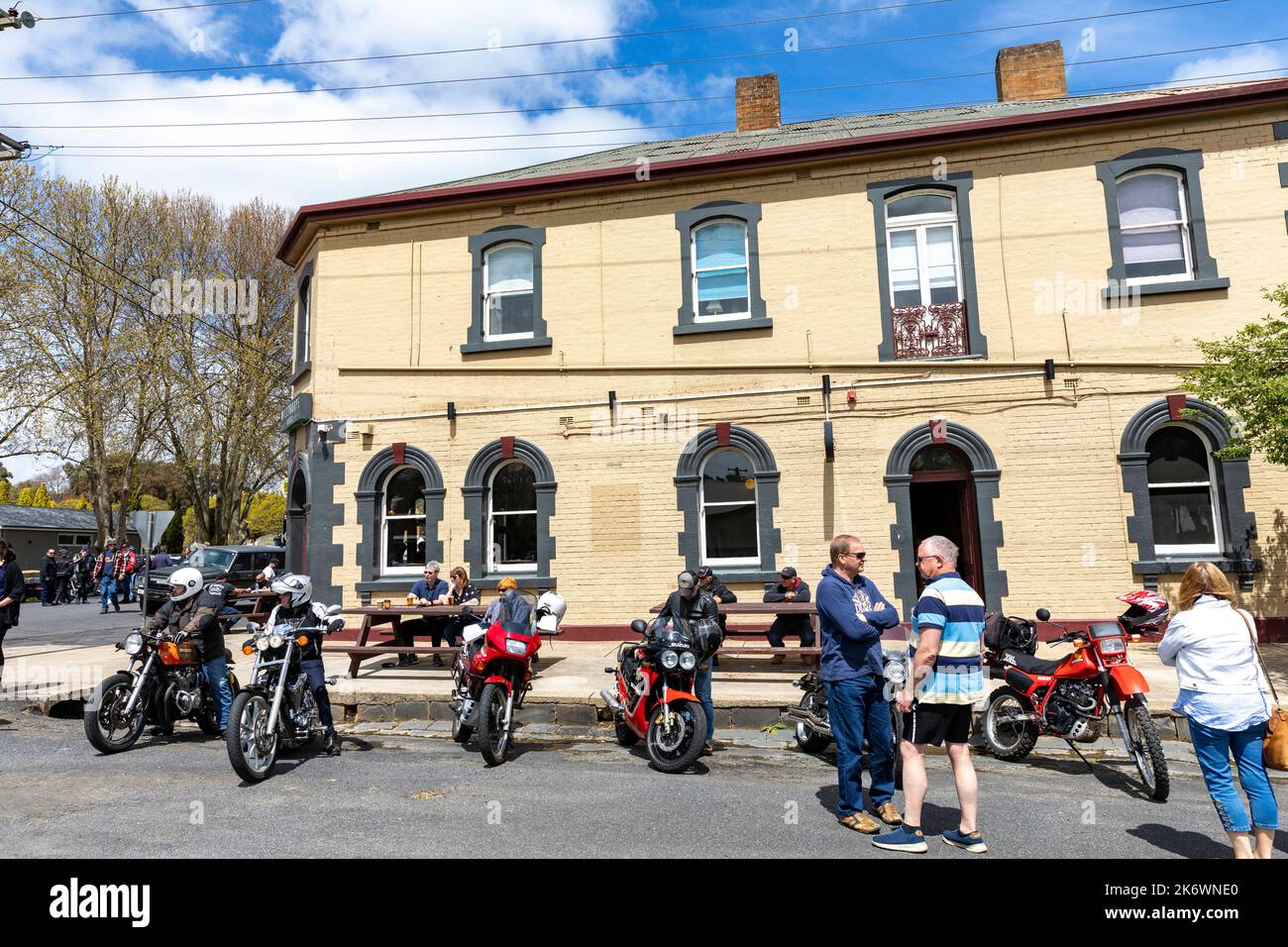 Orange motorcycle club members meet in Millthorpe historic village ,regional New South Wales,Australia Stock Photo