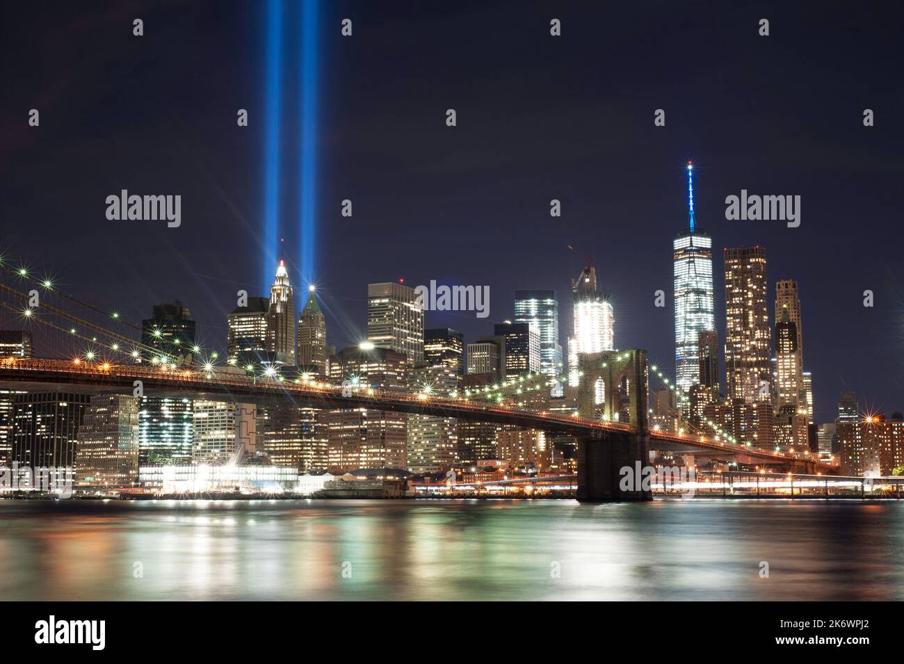 Tribute in Lights: tributing 9/11 victims with two blue rays of light from Ground Zero to the sky in New York City. Stock Photo