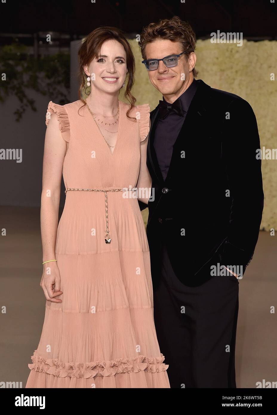 Lauren A. E. Schuker and Jason Blum walking the red carpet at the