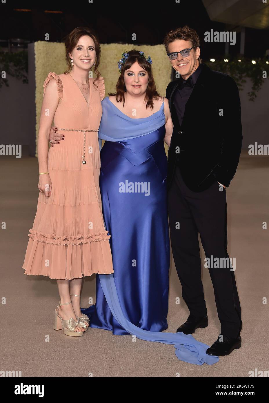 Lauren A. E. Schuker, Lena Dunham and Jason Blum walking the red carpet