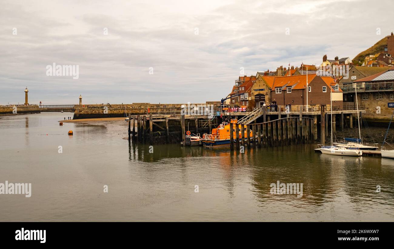 The RNLI lifeboat and lifeboat shed in Whitby harbour Stock Photo