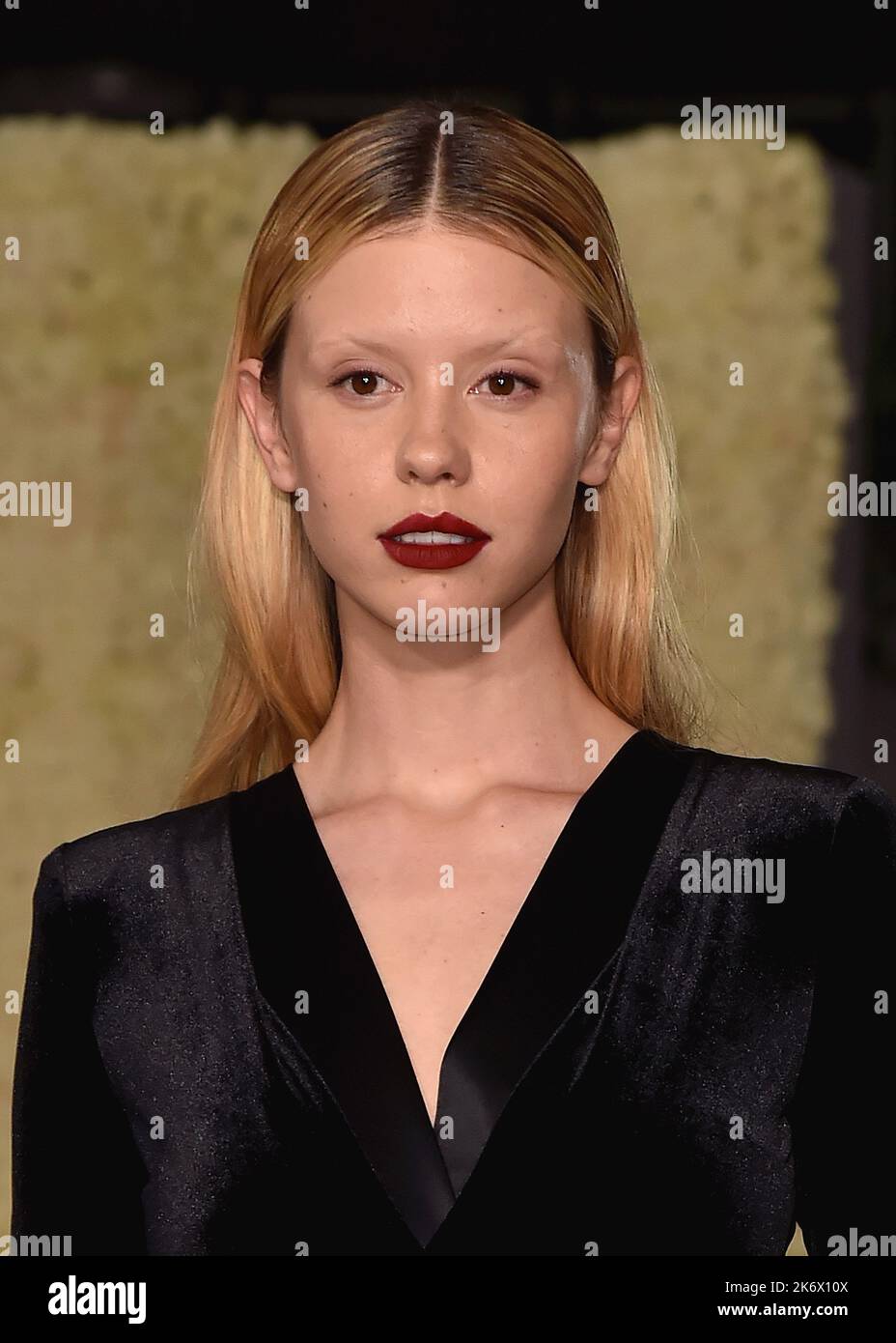Mia Goth walking the red carpet at the Second Annual Academy Museum