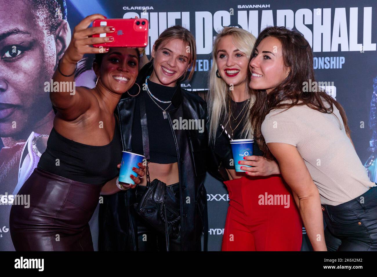 The O2, London, UK. 15th October 2022.  Ebony Rainford-Brent, Laura Crane, Lucy Cork and Aimee Fuller take a selfie on the red carpet at The O2 for the first-ever all-female boxing event in history.  Savannah Marshall and Claressa Shields will headline Boxxer’s Legacy show for the Undisputed World Middleweight Title. Photo by Amanda Rose/Alamy Live News Stock Photo