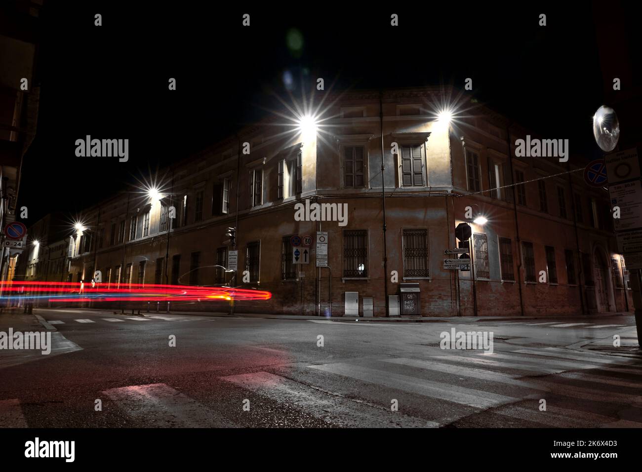 Red arrow of light in the night Stock Photo