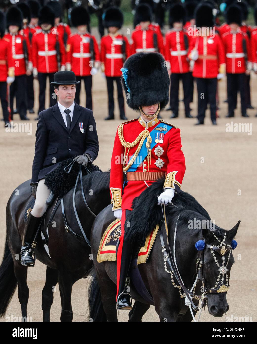 Prince William, now the Prince of Wales, inspecting the line in  ceremonial uniform on horseback, the Colonel's Review,  Trooping the Colour, London Stock Photo