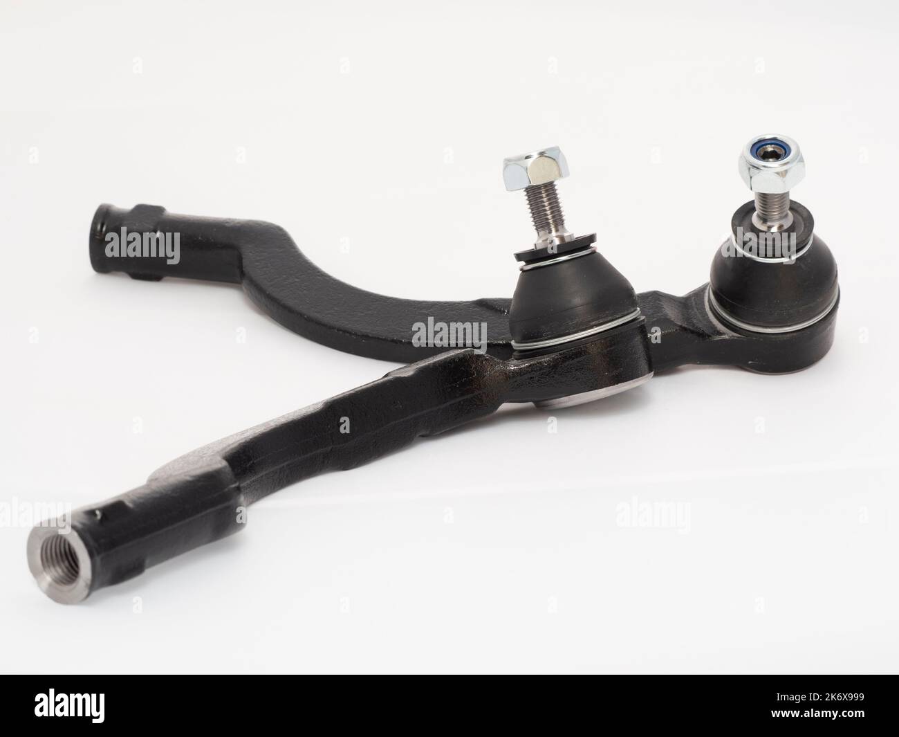 Car track rod end steering joint isolated against a white background