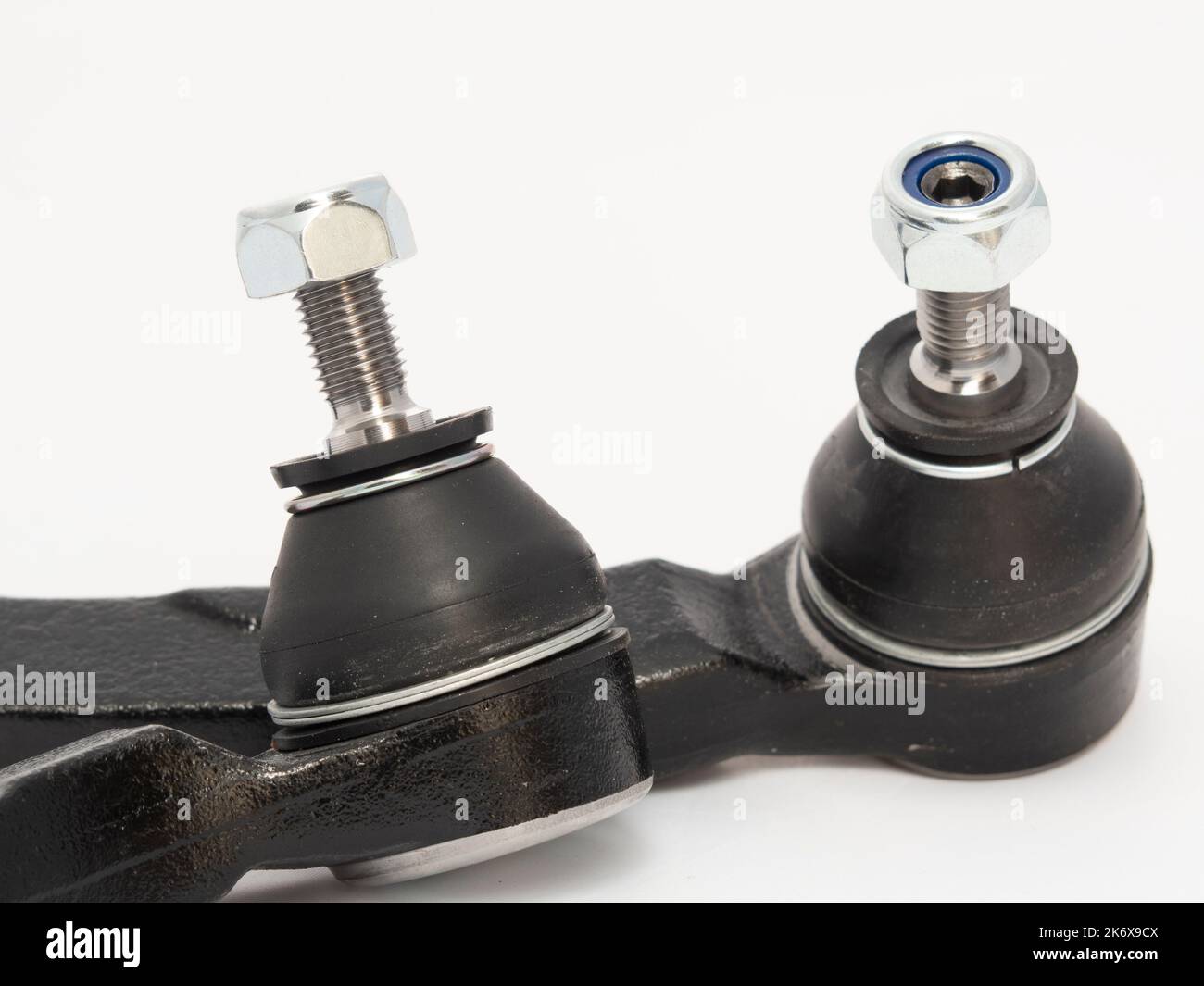 Car track rod end steering joint isolated against a white background