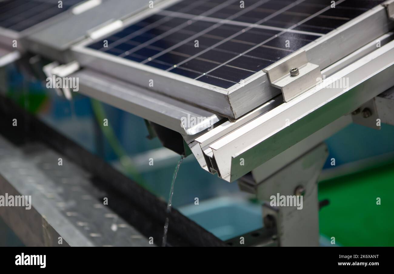 Closeup of Photovoltaic panel system installation with rain gutter