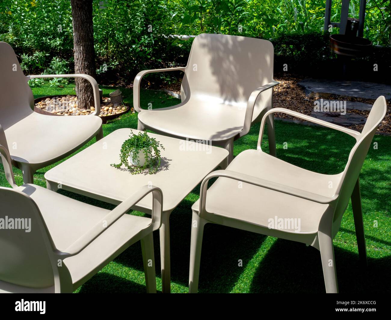 White plastic garden chair hi res stock photography and images