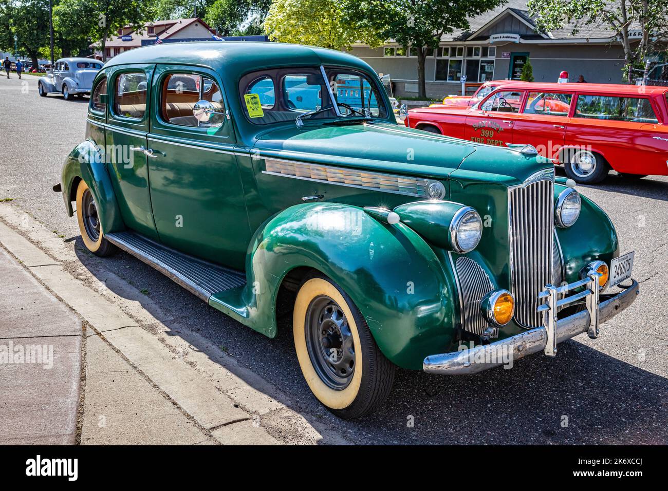 Falcon Heights, MN - June 19, 2022: High perspective front corner view of a 1940 Packard 110 4 Door Sedan at a local car show. Stock Photo